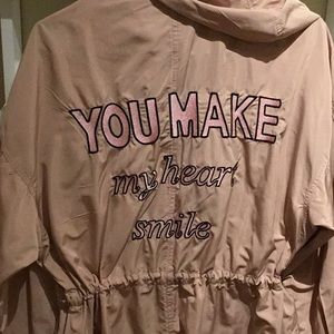 Thin Cream Colored Raincoat